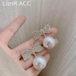 Bow And Pearl Earings