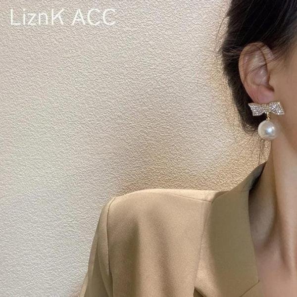 Bow And Pearl Earings